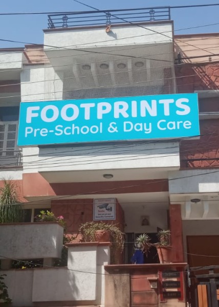 Footprints storefront signage